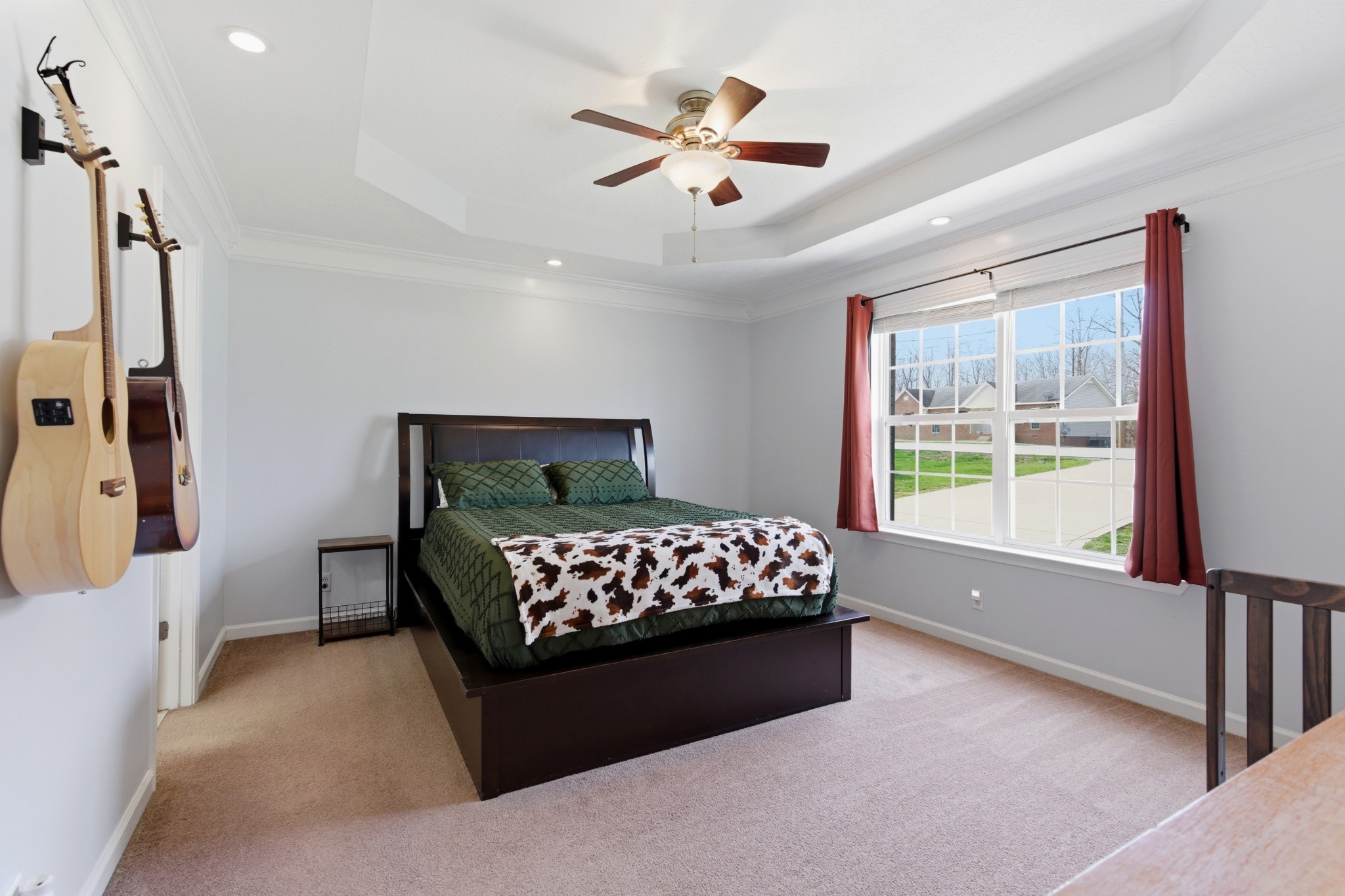 3080 Bowker Road Charlotte, TN 37036 - Photo 16 of 31 a bed sitting in a bedroom next to a window