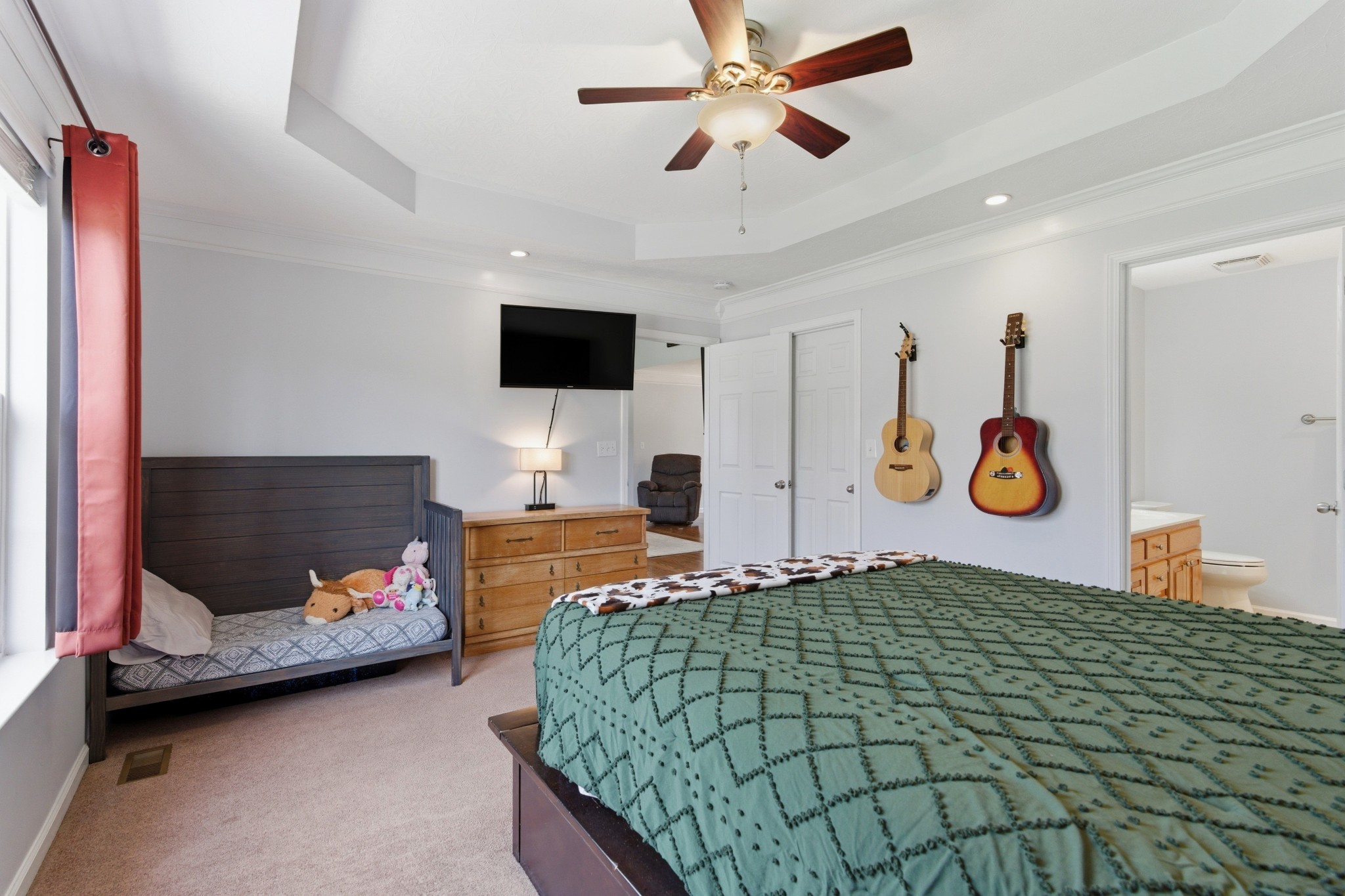 3080 Bowker Road Charlotte, TN 37036 - Photo 17 of 31 a bedroom with a bed and a television