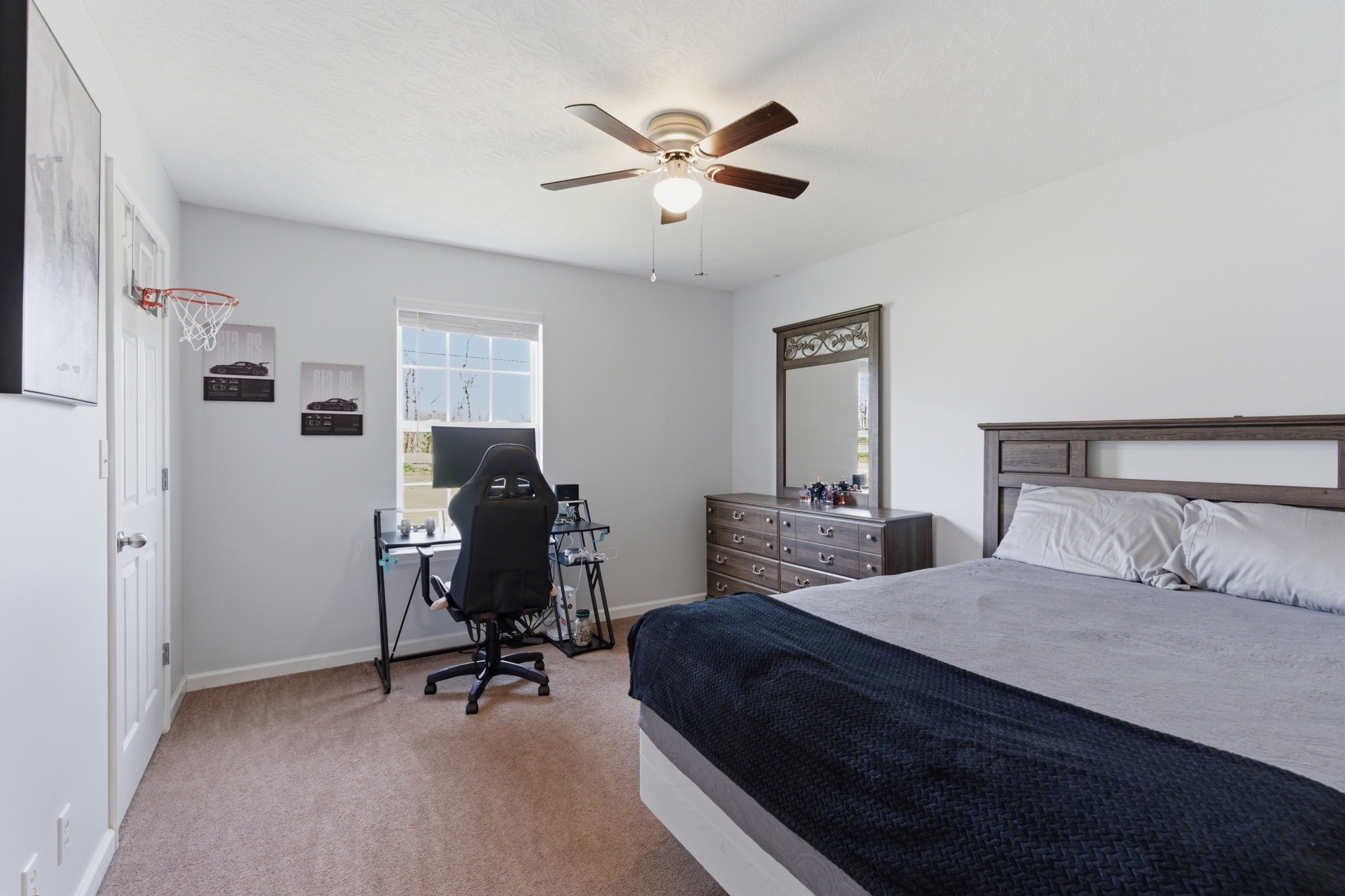 3080 Bowker Road Charlotte, TN 37036 - Photo 21 of 31 a bedroom with a bed and a desk