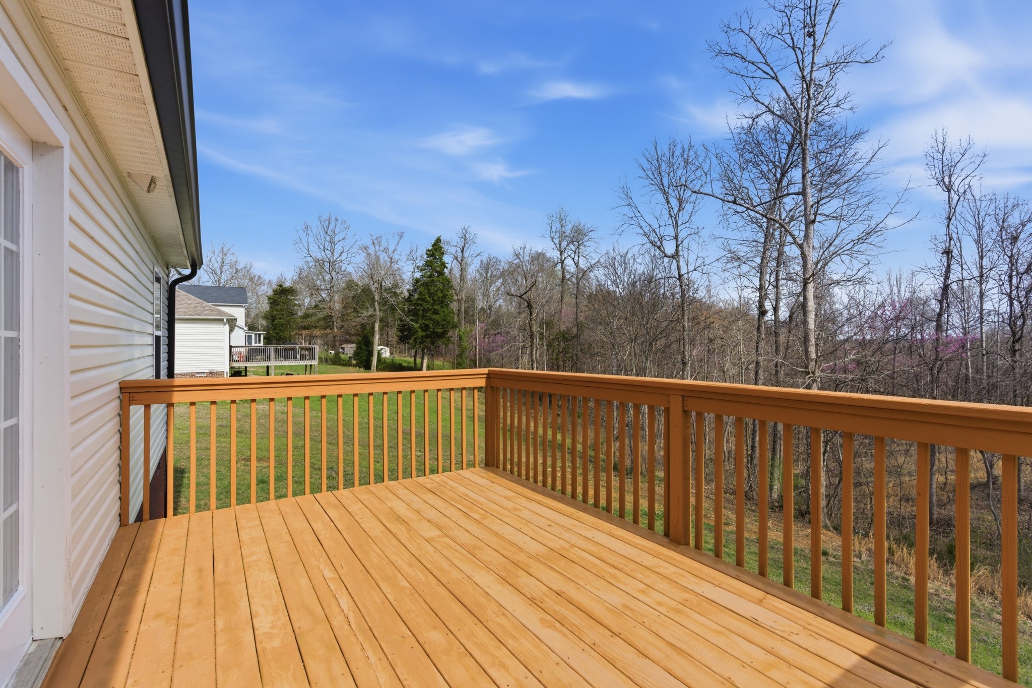 3080 Bowker Road Charlotte, TN 37036 - Photo 24 of 31 a view of balcony with wooden floor and fence