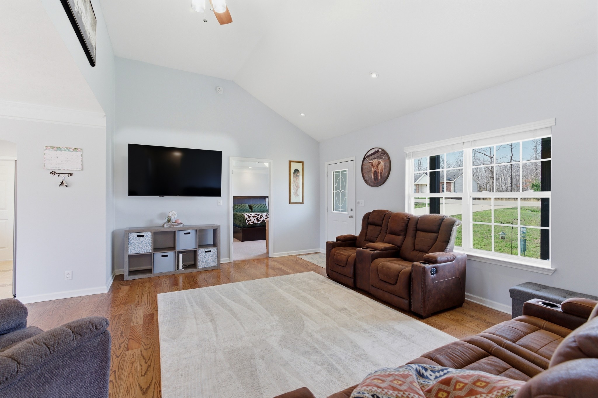 3080 Bowker Road Charlotte, TN 37036 - Photo 4 of 31 a living room with furniture and a flat screen tv