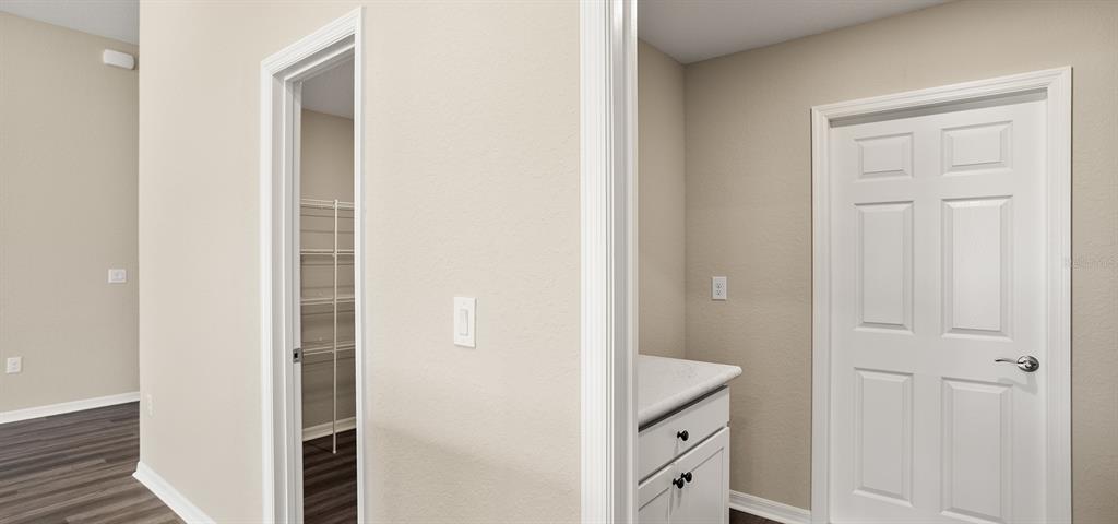 7654 Southwest 6th Loop Ocala, FL 34474 - Photo 19 of 28 a view of a bathroom with a sink and a mirror