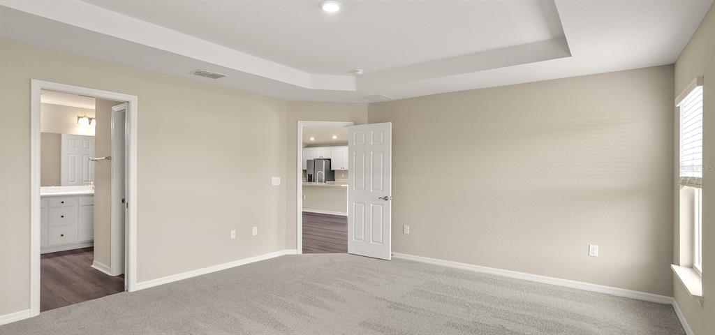 7654 Southwest 6th Loop Ocala, FL 34474 - Photo 21 of 28 wooden floor in an empty room