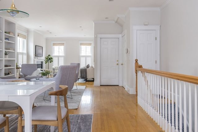 a view of a livingroom with furniture and window