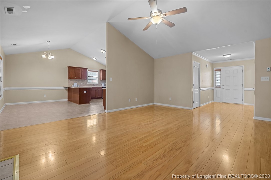 618 Valley Oak Drive Bunnlevel, NC 28323 - Photo 11 of 38 a view of empty room with wooden floor