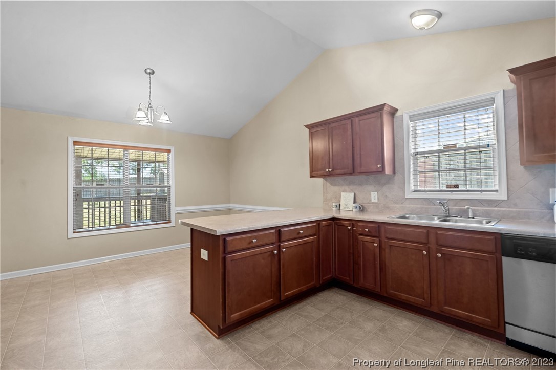618 Valley Oak Drive Bunnlevel, NC 28323 - Photo 13 of 38 a spacious bathroom with a sink and a bathtub