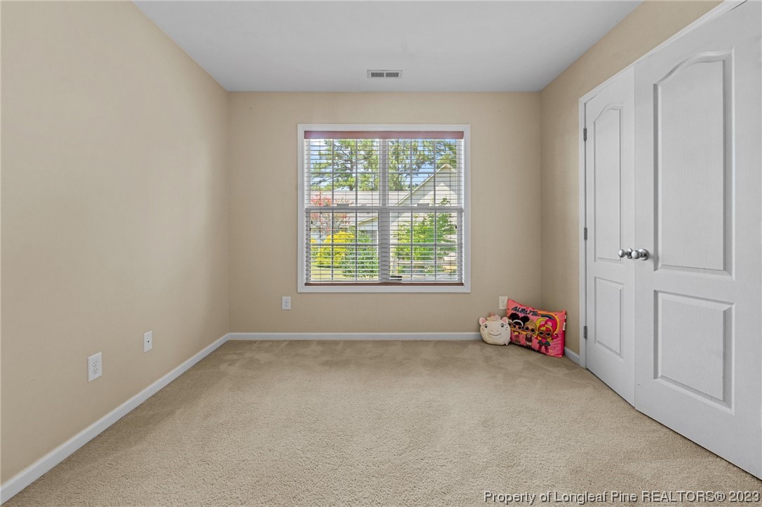 618 Valley Oak Drive Bunnlevel, NC 28323 - Photo 22 of 38 wooden floor and window in a room