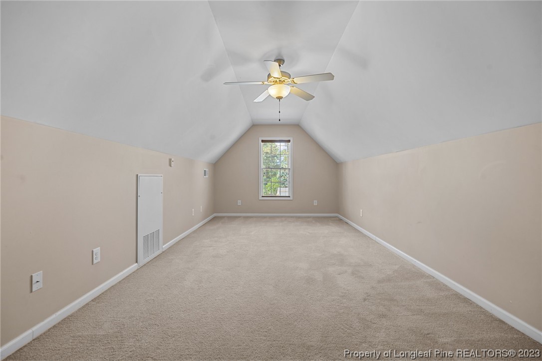 618 Valley Oak Drive Bunnlevel, NC 28323 - Photo 23 of 38 wooden floor in an empty room with a window