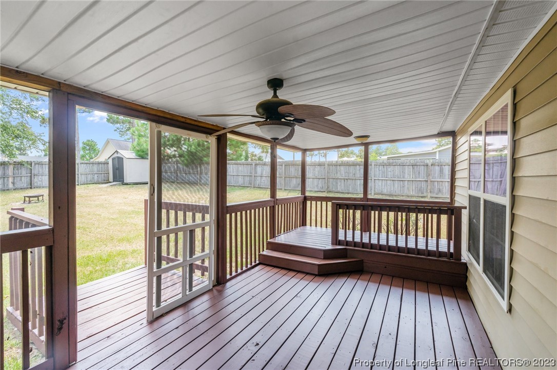 618 Valley Oak Drive Bunnlevel, NC 28323 - Photo 27 of 38 a view of porch with wooden floor and outdoor seating