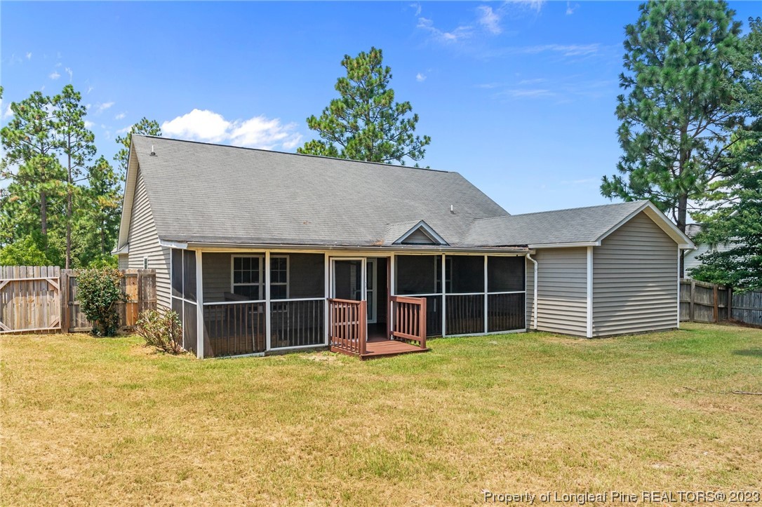 618 Valley Oak Drive Bunnlevel, NC 28323 - Photo 30 of 38 a view of a house with a yard and potted plants