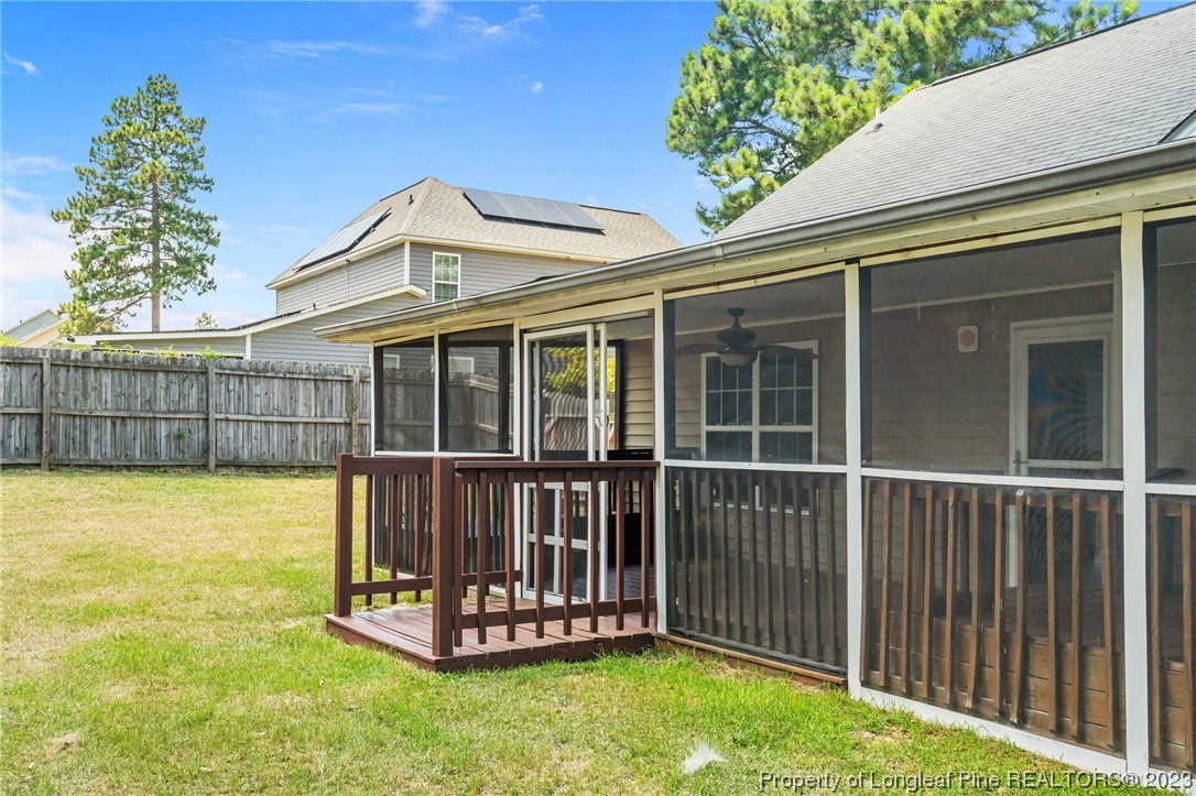 618 Valley Oak Drive Bunnlevel, NC 28323 - Photo 31 of 38 a front view of a house with a garden and deck