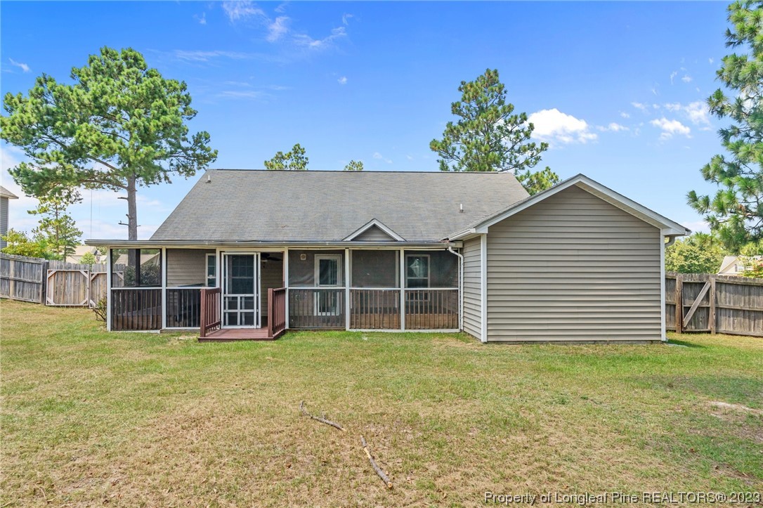 618 Valley Oak Drive Bunnlevel, NC 28323 - Photo 32 of 38 a view of a house with a yard and sitting area