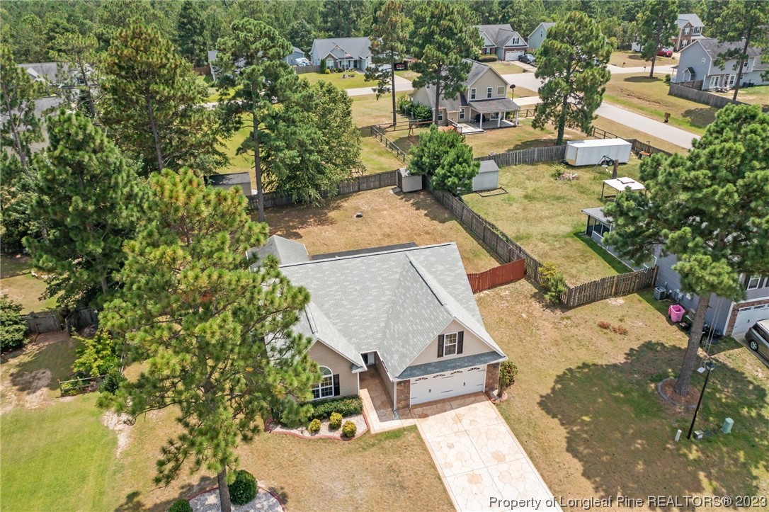 618 Valley Oak Drive Bunnlevel, NC 28323 - Photo 37 of 38 an aerial view of a house with a yard basket ball court and outdoor seating