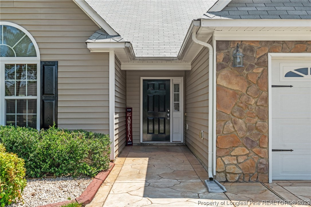 618 Valley Oak Drive Bunnlevel, NC 28323 - Photo 5 of 38 a view of a entryway door front of house