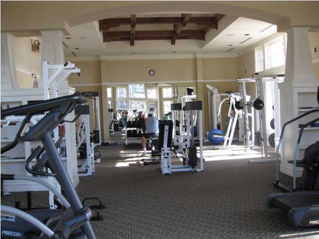 1105 Prospect Promenade, Unit 101 Panama City Beach, FL 32413 - Photo 21 of 27 a view of a room with gym equipment