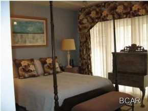 1105 Prospect Promenade, Unit 101 Panama City Beach, FL 32413 - Photo 6 of 27 a bedroom with a bed and a window