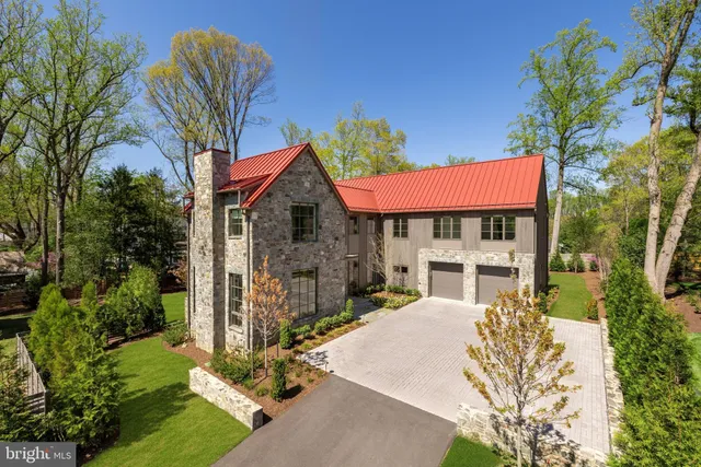 a view of house with outdoor space and sitting area