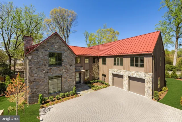 a front view of a house with yard