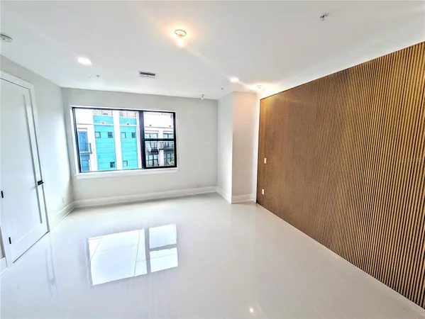 an empty room with windows