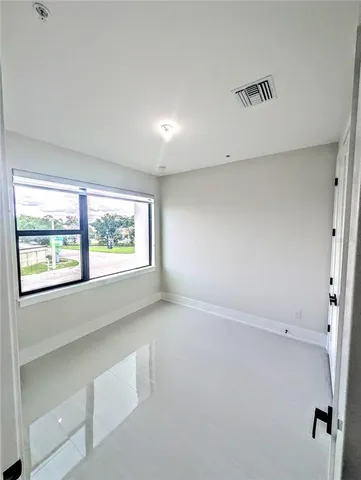 an empty room with a window