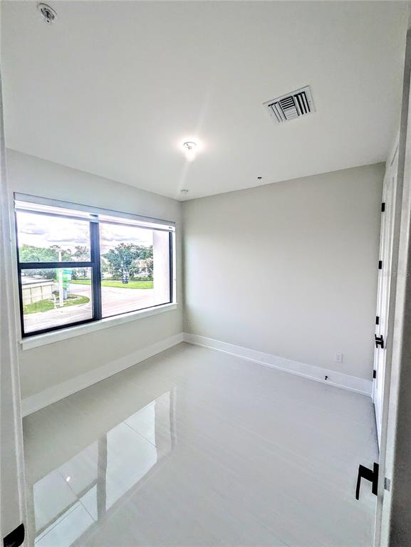 2194 Fruitville Road Sarasota, FL 34237 - Photo 24 of 32 an empty room with a window