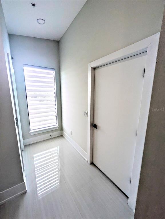 2194 Fruitville Road Sarasota, FL 34237 - Photo 26 of 32 an empty room with windows