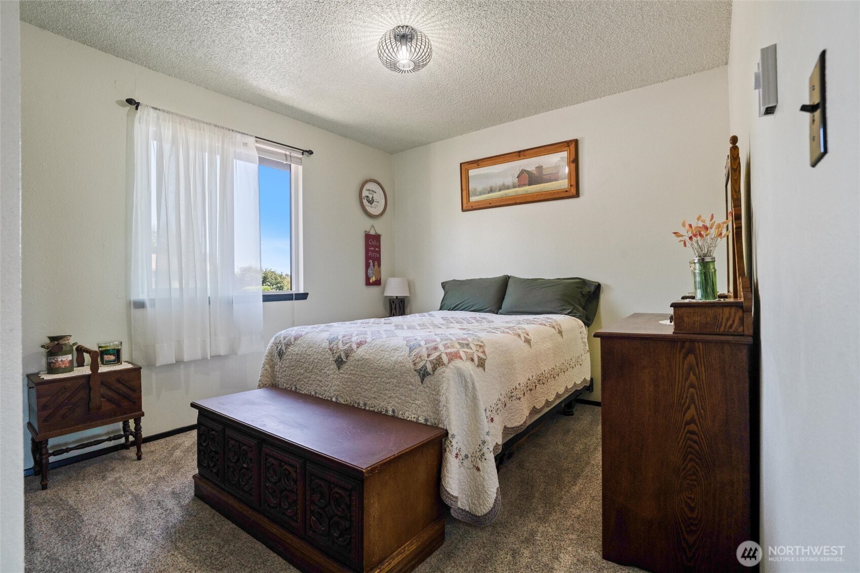 3560 Narrows View Lane Northeast, Unit 202 Bremerton, WA 98310 - Photo 18 of 27 a bedroom with a bed and window