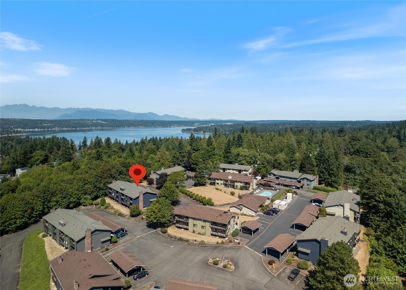 3560 Narrows View Lane Northeast, Unit 202 Bremerton, WA 98310 - Photo 3 of 27 an aerial view of a houses with city view and lake view