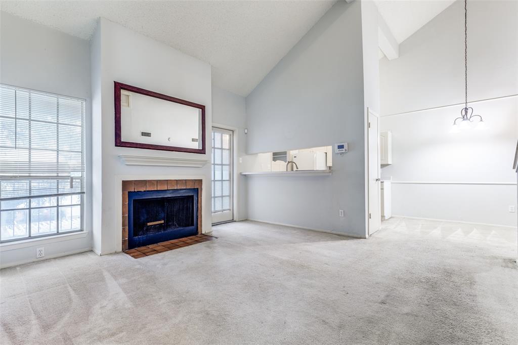 a view of a livingroom with a fireplace