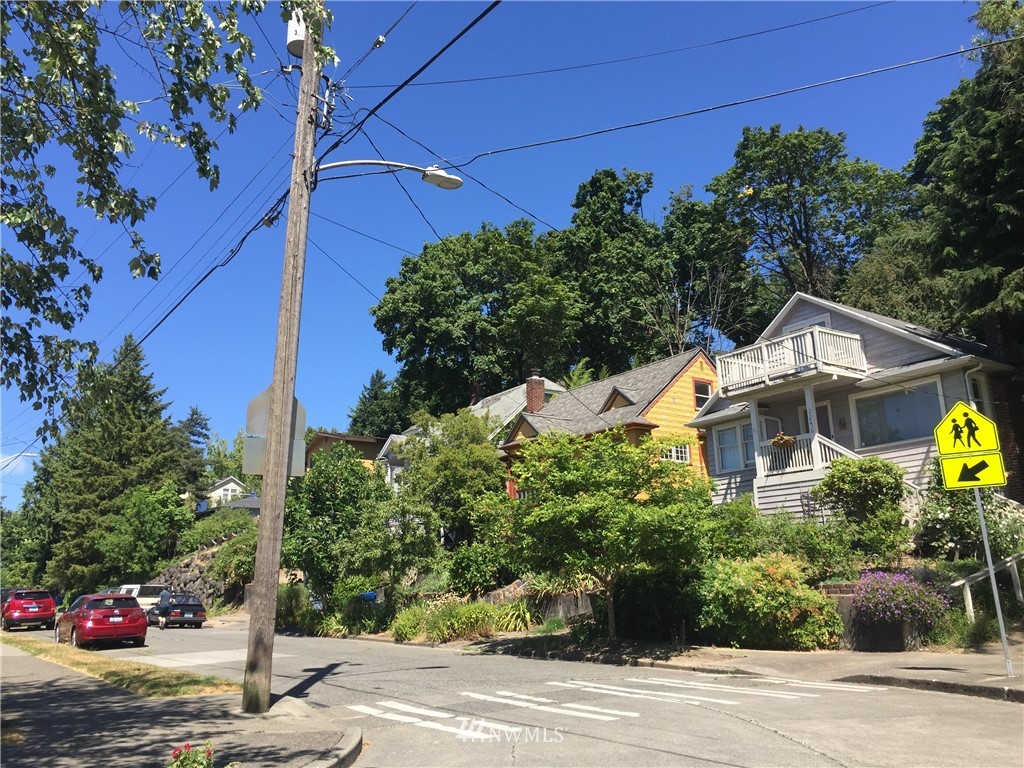 3301 York Road South Seattle, WA 98144 - Photo 16 of 21 a front view of a house with a yard and garage