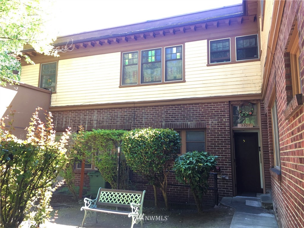 3301 York Road South Seattle, WA 98144 - Photo 3 of 21 a front view of a house with a yard