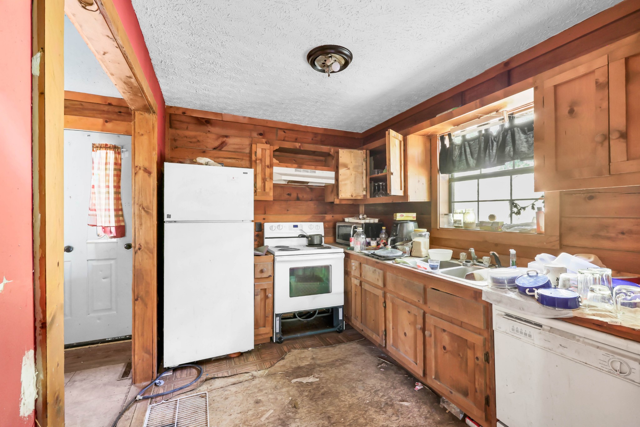 348 Shepherd Hollow Road Indian Mound, TN 37079 - Photo 12 of 23 a kitchen with a sink refrigerator and window