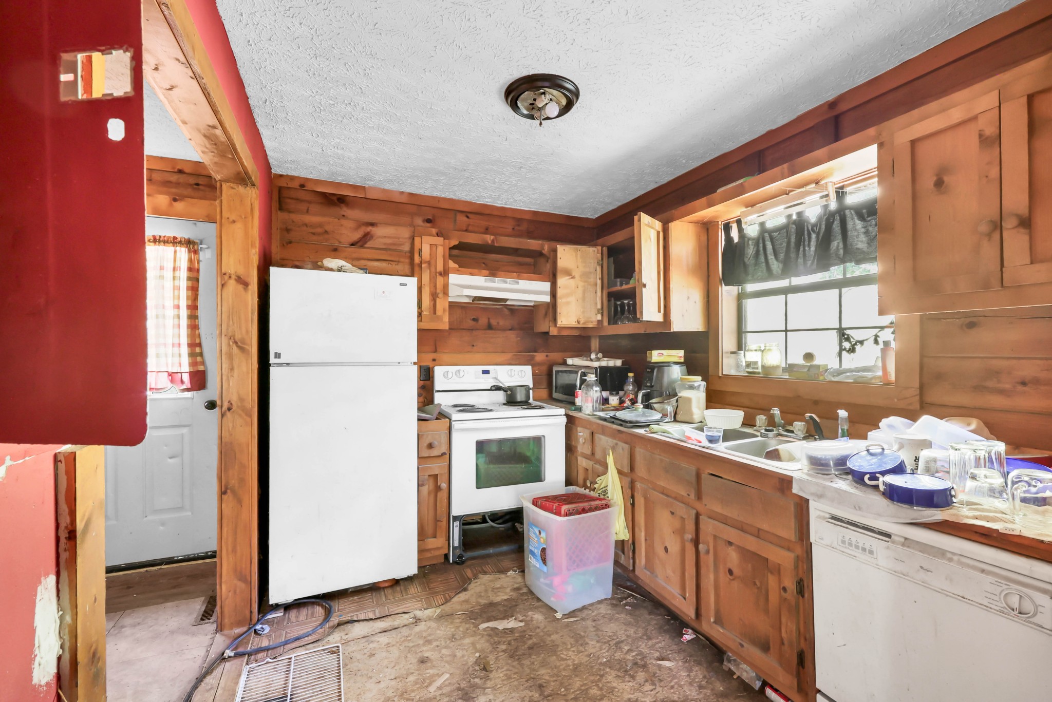 348 Shepherd Hollow Road Indian Mound, TN 37079 - Photo 13 of 23 a kitchen with a sink refrigerator and window