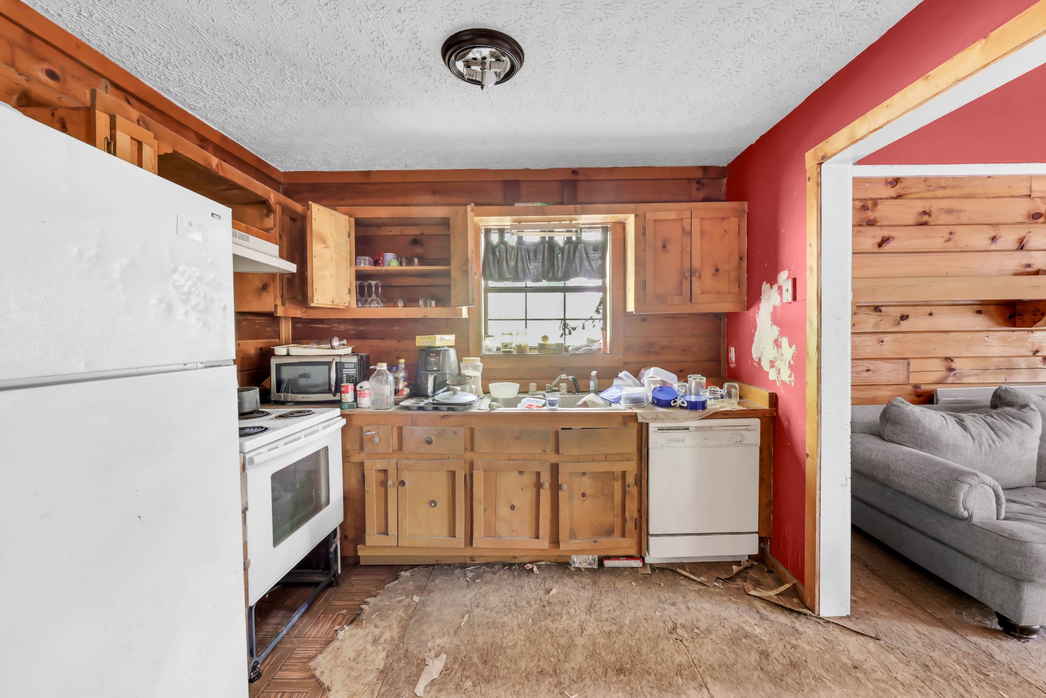 348 Shepherd Hollow Road Indian Mound, TN 37079 - Photo 14 of 23 a kitchen with stainless steel appliances granite countertop a stove a sink and a refrigerator