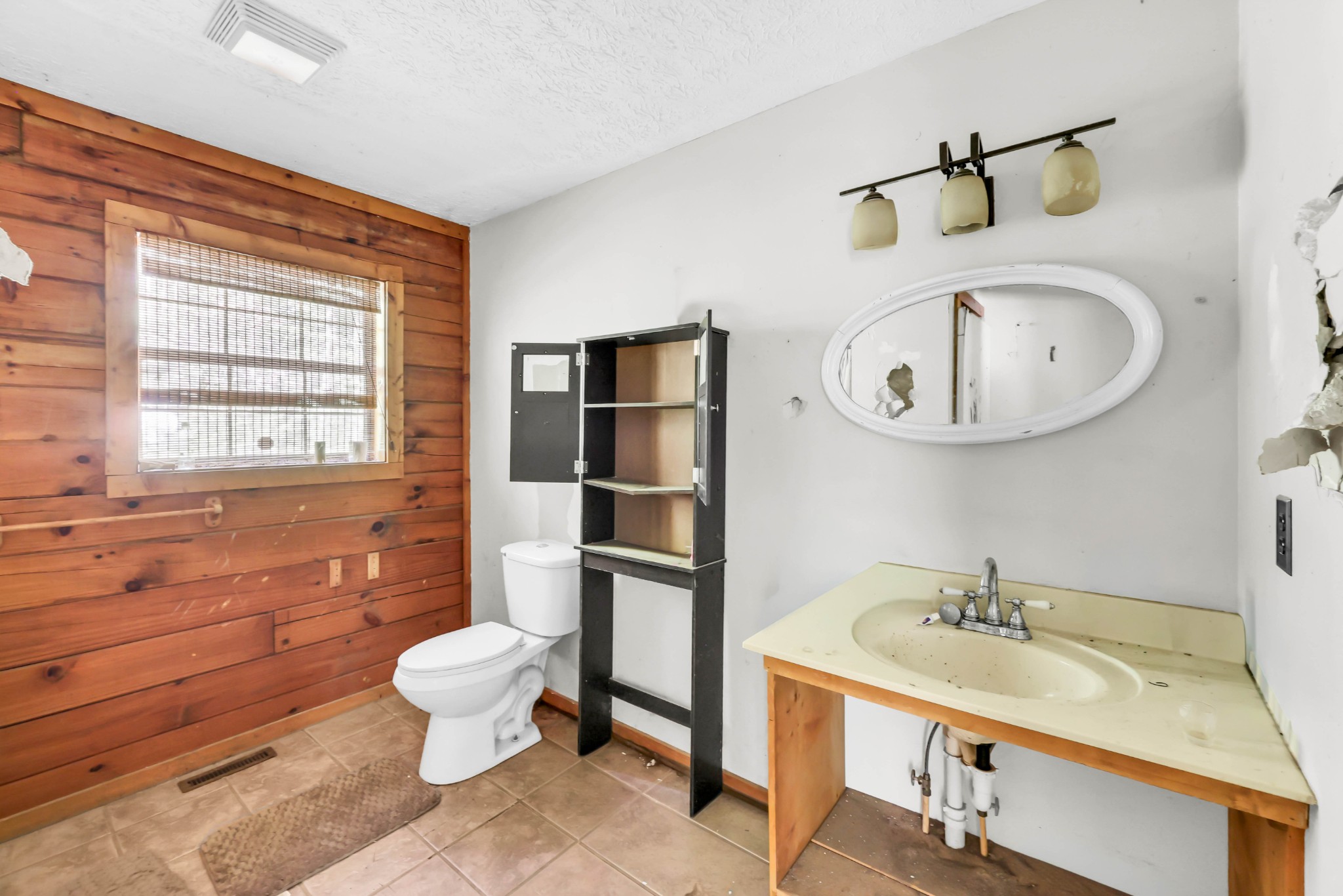 348 Shepherd Hollow Road Indian Mound, TN 37079 - Photo 16 of 23 a bathroom with a sink toilet vanity and tub