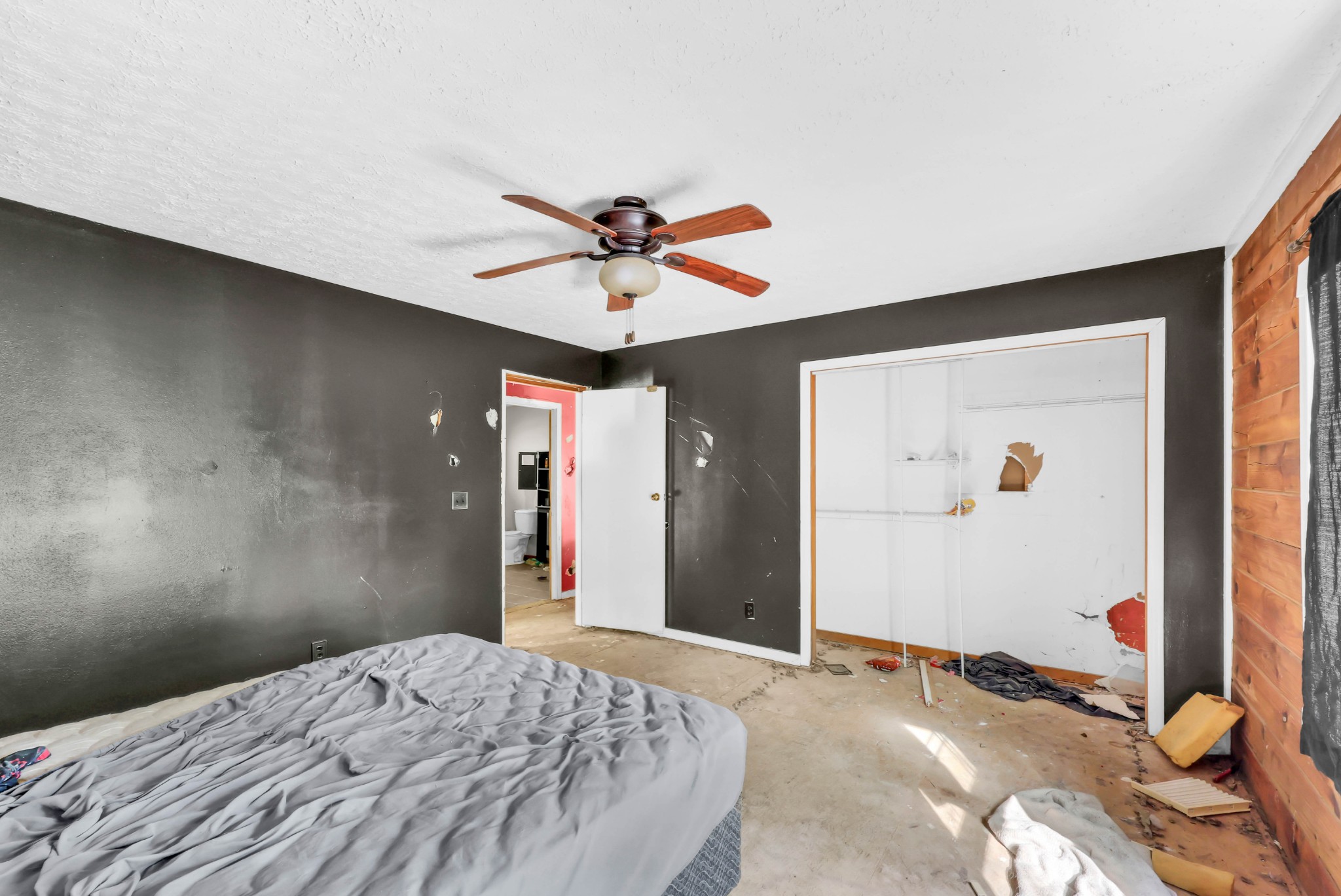 348 Shepherd Hollow Road Indian Mound, TN 37079 - Photo 22 of 23 a bedroom with a bed and a chandelier