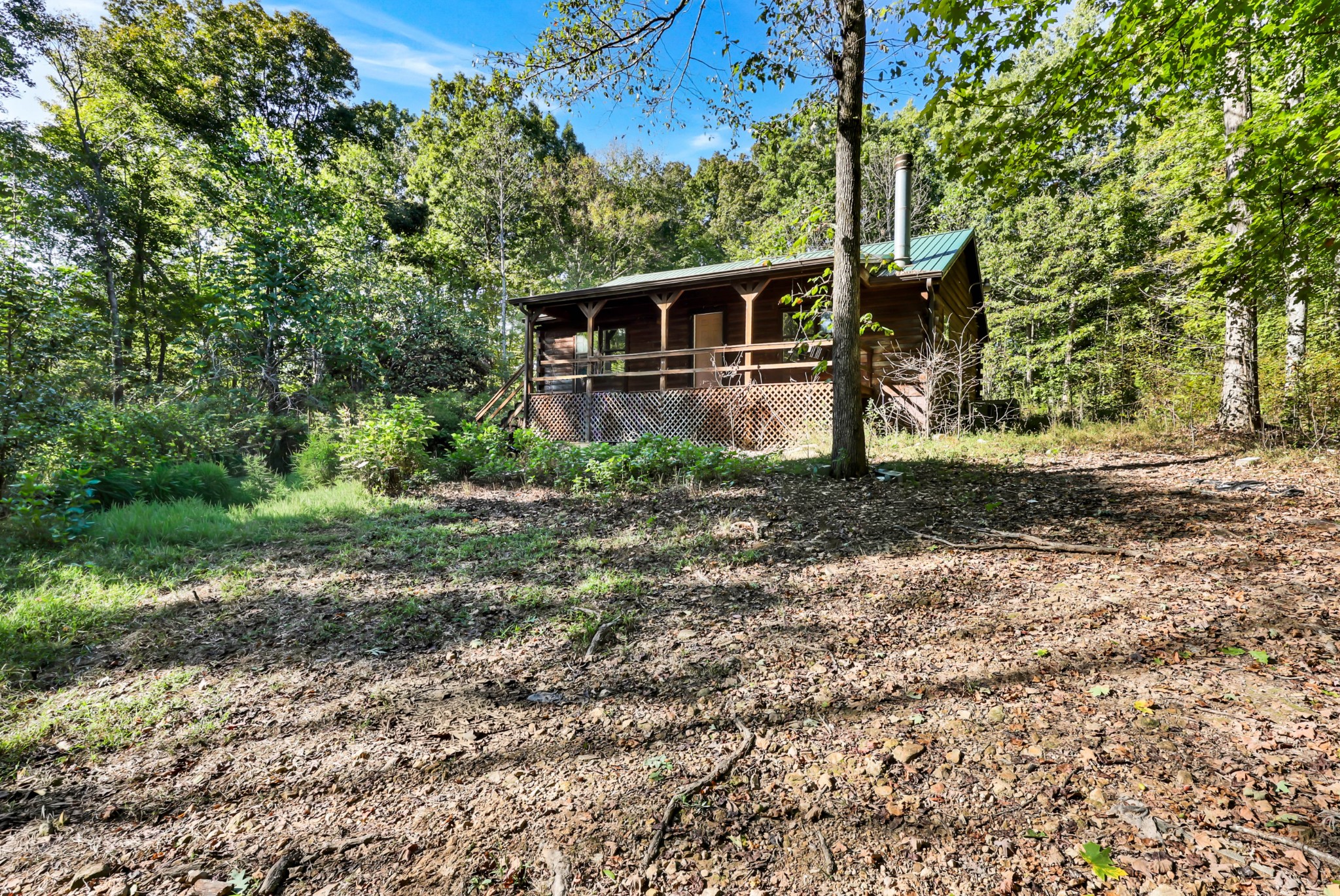 348 Shepherd Hollow Road Indian Mound, TN 37079 - Photo 3 of 23 a view of a house with a yard