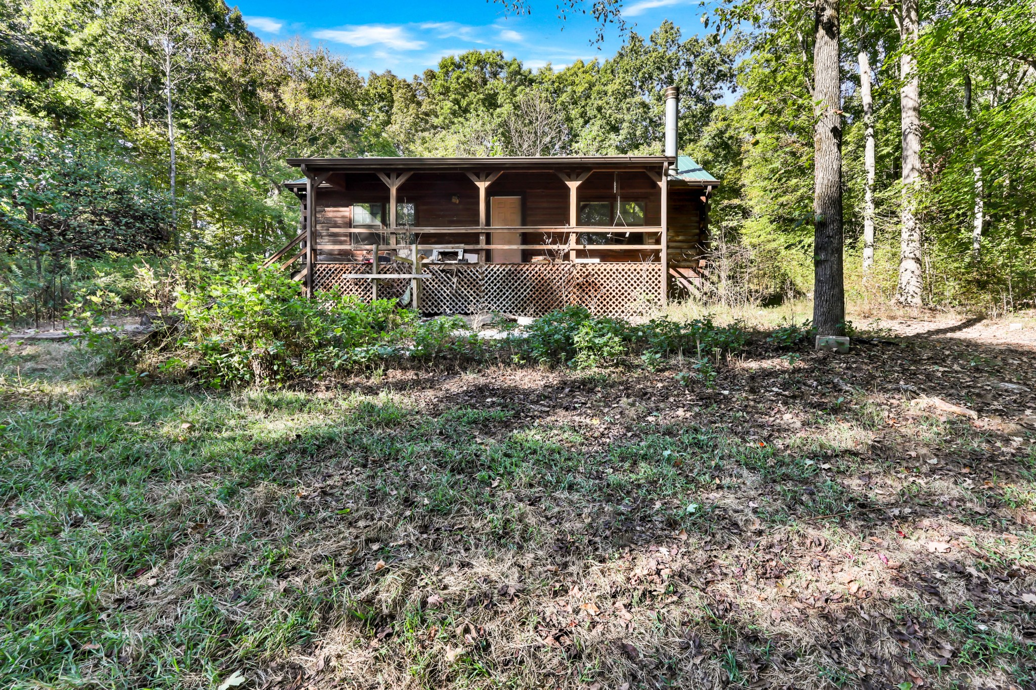 348 Shepherd Hollow Road Indian Mound, TN 37079 - Photo 7 of 23 a front view of a house with garden