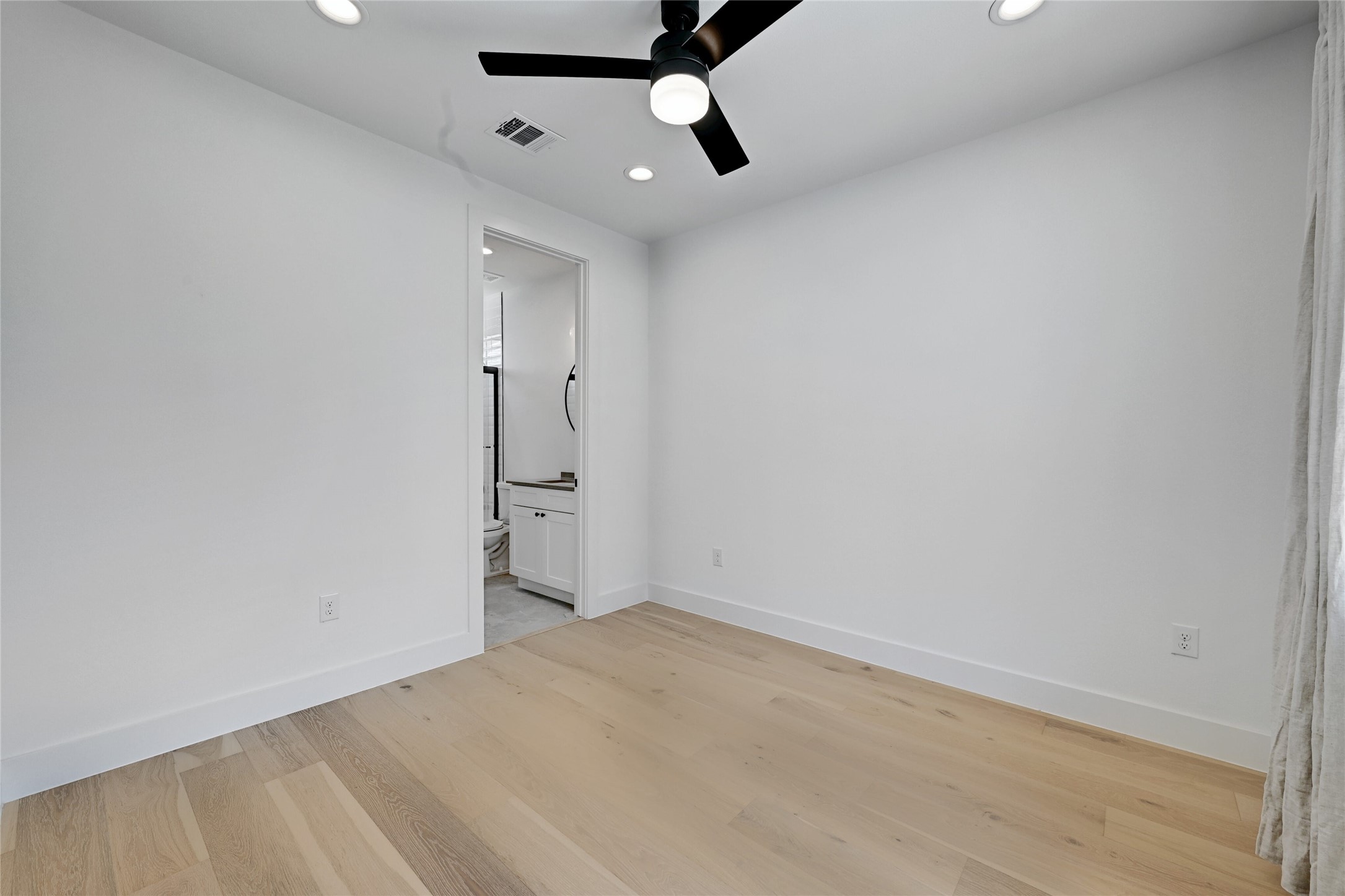 1140 Webberville Road, Unit 9 Austin, TX 78721 - Photo 11 of 13 Secondary Bedroom