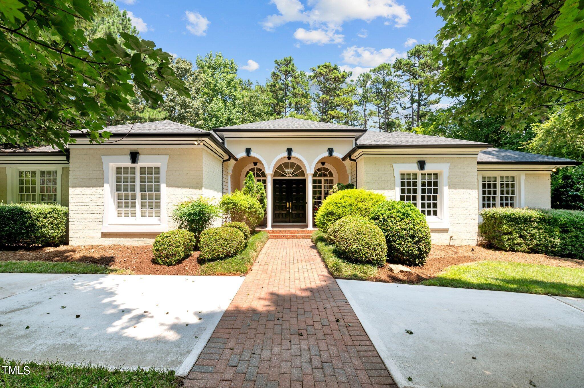 11112 Brass Kettle Road Raleigh, NC 27614 - Photo 1 of 65 front view of a house with a yard