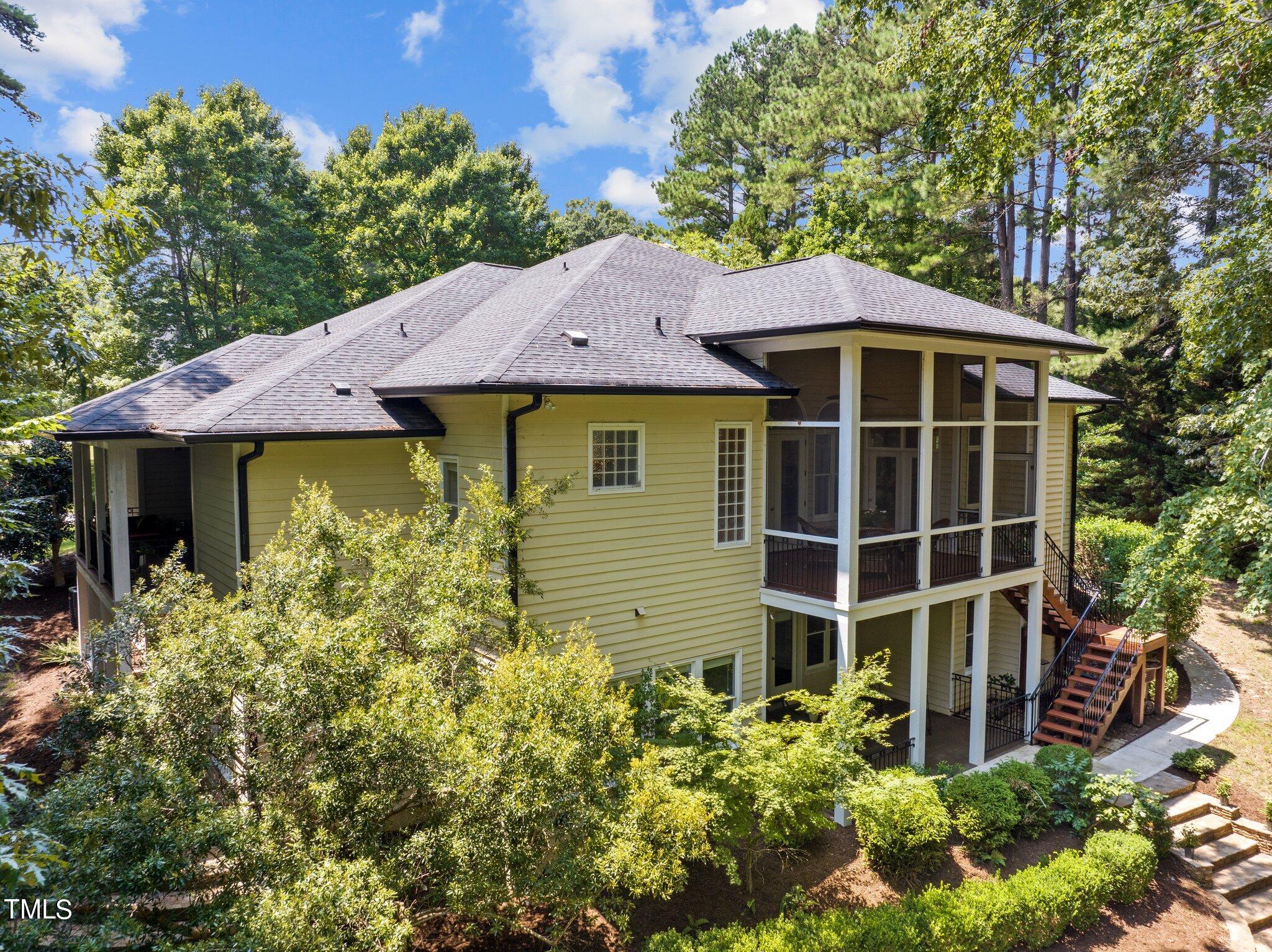 11112 Brass Kettle Road Raleigh, NC 27614 - Photo 3 of 65 a front view of a house with a yard