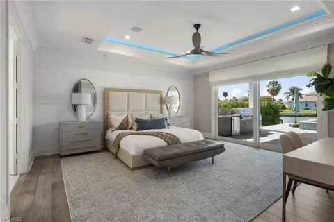 a bed room with a bed and a couch