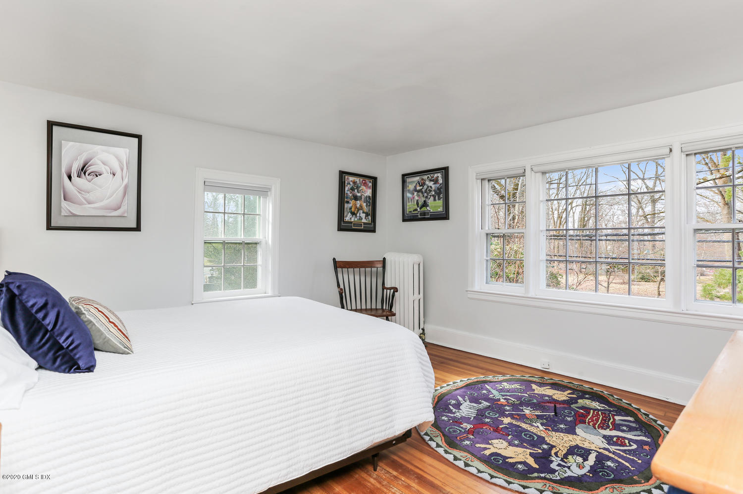 11 Indian Head Road Riverside, CT 06878 - Photo 19 of 30 a bedroom with a bed and a window