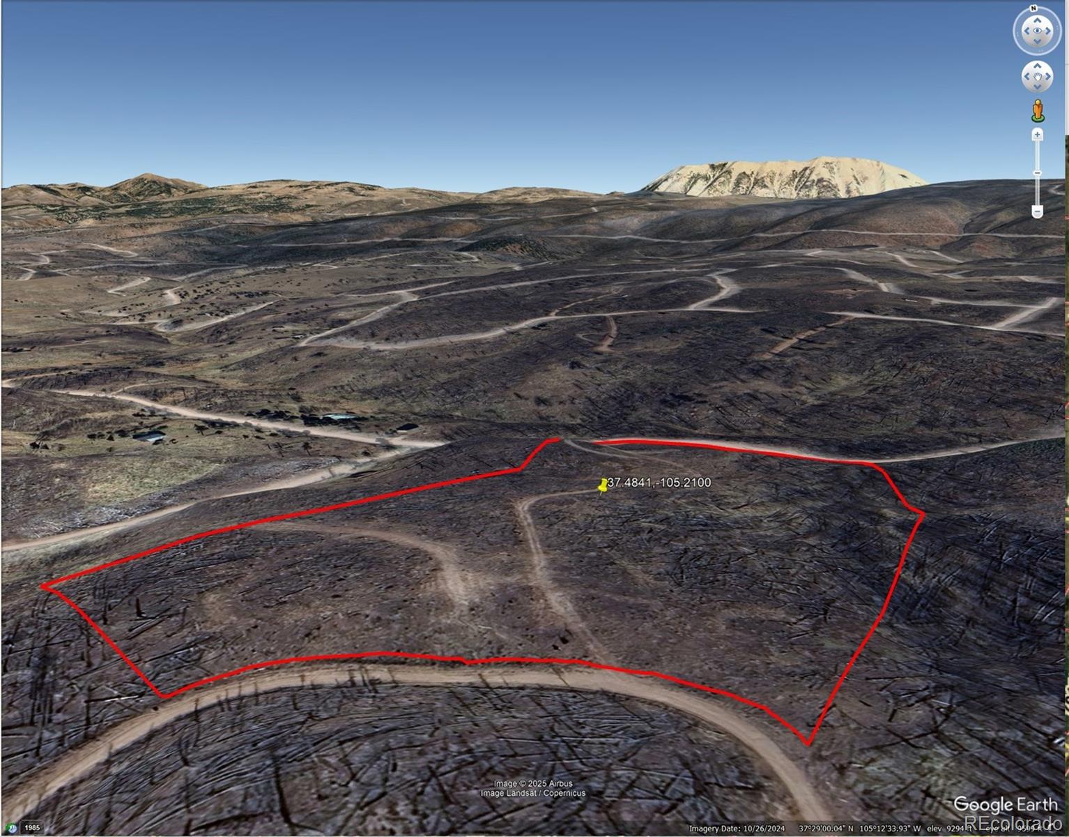 904-908 Forbes Park Road Fort Garland, CO 81133 - Photo 3 of 16 a view of a backyard of a house