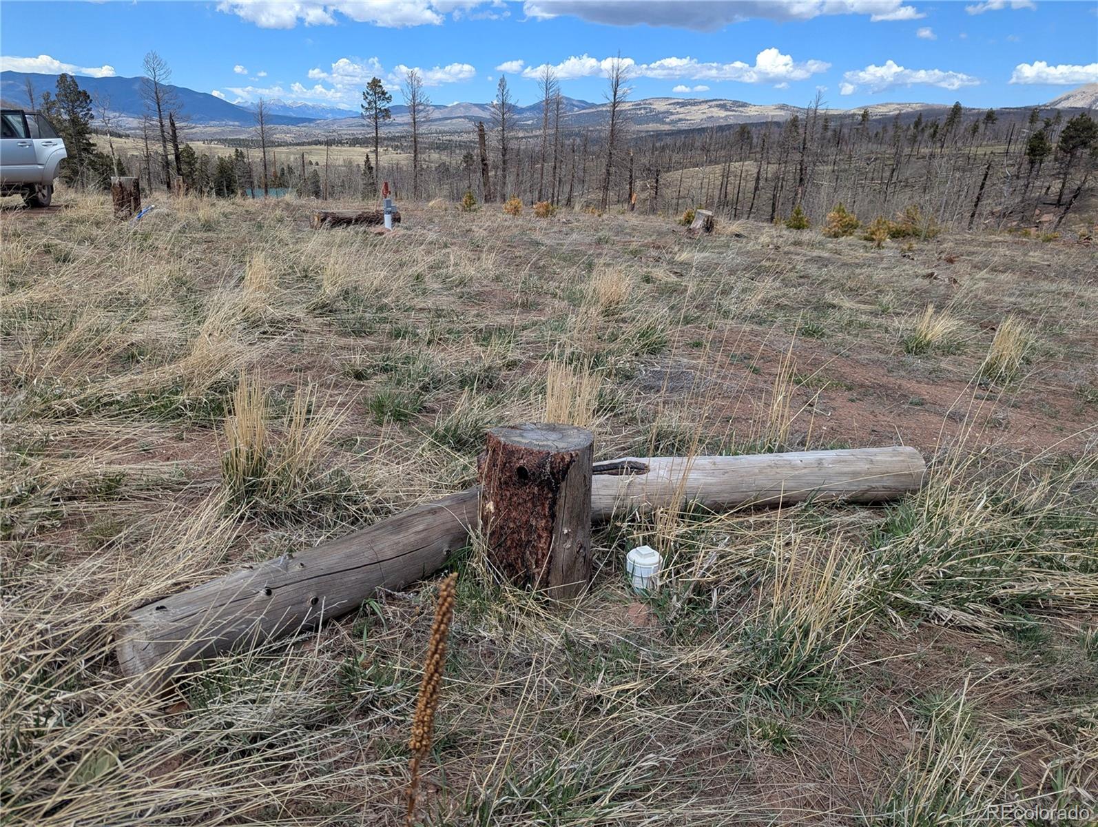 904-908 Forbes Park Road Fort Garland, CO 81133 - Photo 5 of 16 a view of a dry yard with wooden fence