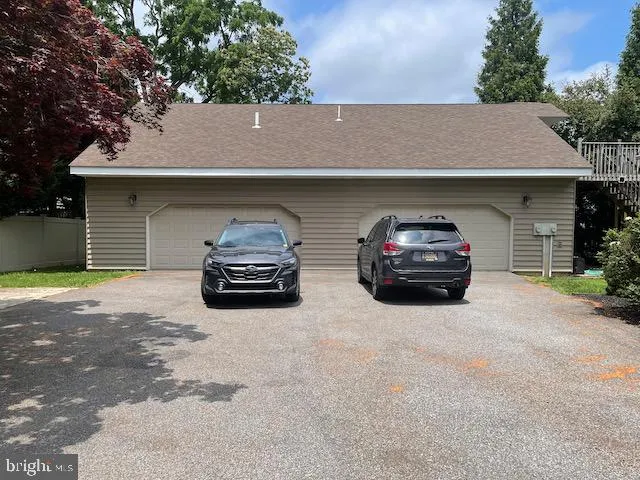 a car parked in front of a house