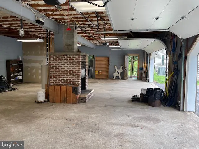 a view of a hallway with stairs