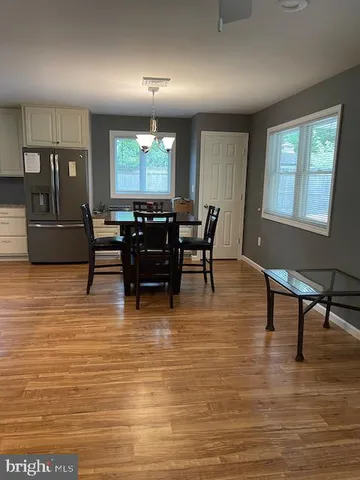 a living room with furniture and window