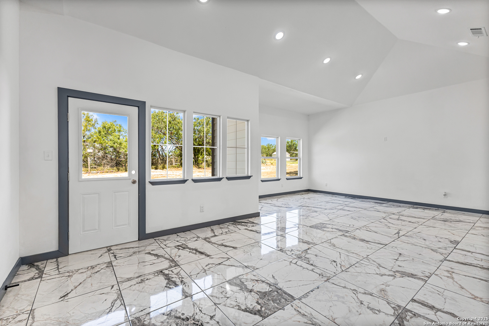 133 Flor Del Sol Road San Antonio, TX 78264 - Photo 11 of 28 a view of an empty room and window
