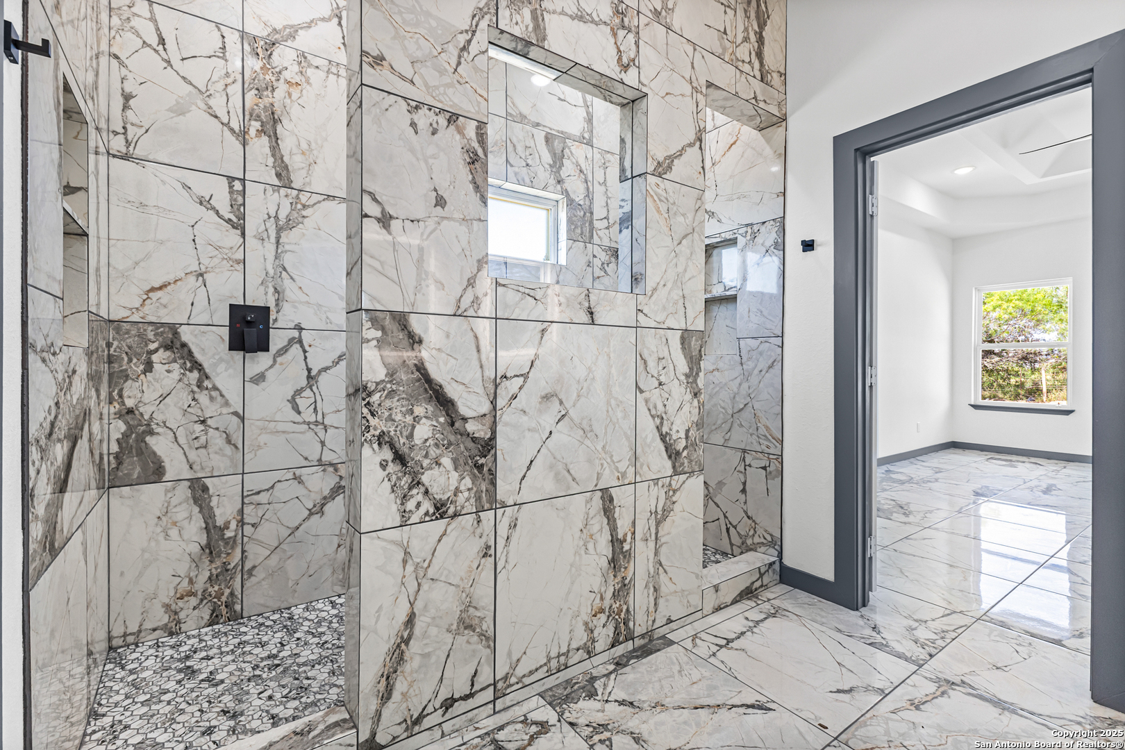 133 Flor Del Sol Road San Antonio, TX 78264 - Photo 16 of 28 a bathroom with a bathtub and shower